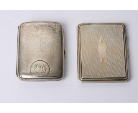 A silver cigarette case, Birmingham 1903 and a silver compact, Birmingham 1938.