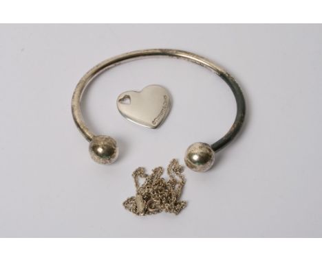 A silver Tiffany heart pendant and chain plus a bangle