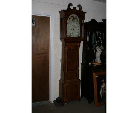 An eight day oak longcase clock with moon face dial signed Th.S.Harlow Stone