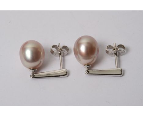 A pair of white gold and pearl earrings 