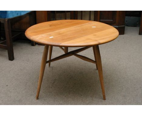 A light wood Ercol gateleg coffee table.