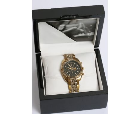 A Gents Aston Gerard watch with simulated diamond studded bezel and strap, the dial with three subsidiary dials. And a gents 