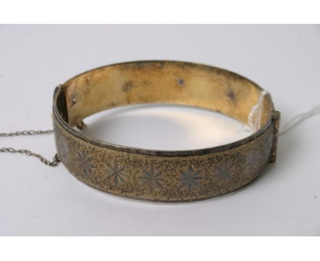 A solid silver bangle