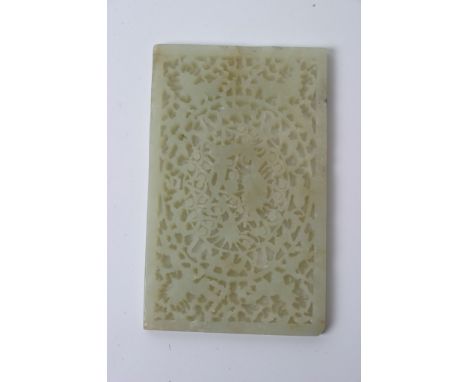 A well carved jade panel, 8.5cm x 14cm.