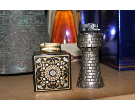 A Carlton ware 1970s psychadelic ceramic cigarette lighter of square shape and a vintage novelty cigarette lighter in the for