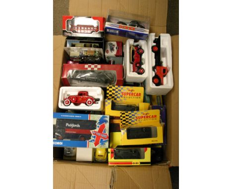A collection of boxed model vehicles including Corgi, original omnibus etc