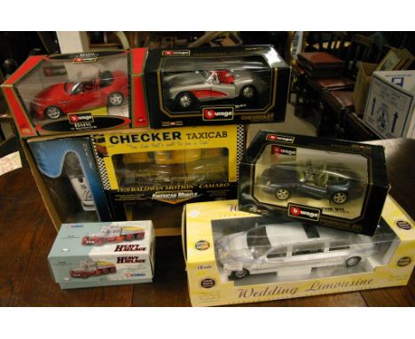 A collection of 6 boxed 1/18th scale models including Burgao, SunStar, American Muscle and Solido together with a boxed ford 