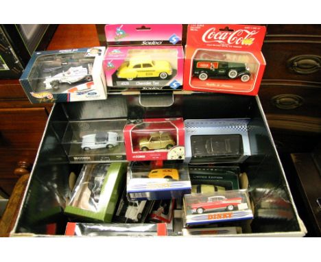 A box containing boxed model vehicles including Dinky, Yesteryear, Corgi, SunStar, Vitesse, Mini champs, Schuco, Solido etc 