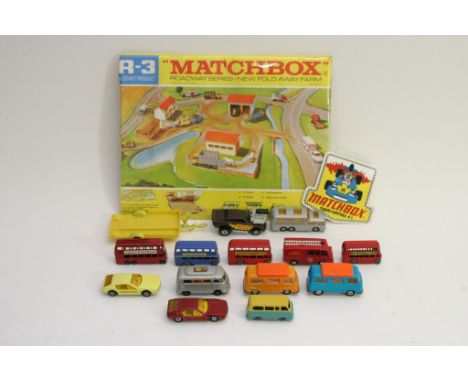 A collection of Matchbox cars and buses including a yellow No. 20 Lamborghini Marzal, a No 23 Superfast Volkswagen Camper wit