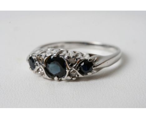 A 9ct white gold sapphire and diamond ring 