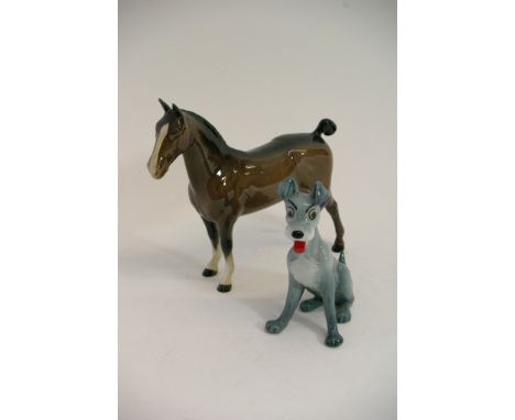 A Wade 'blow up' model of Disney's Tramp and a Beswick horse. Condition Report: Tip of horse's ear restuck