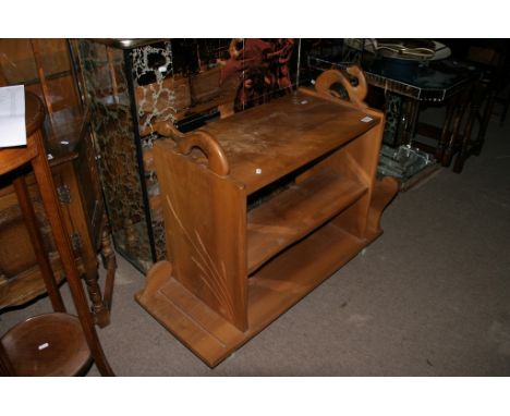 An elm storage unit on casters with carved figural decoration of stoats and birds in the manner of Robert 'Mouseman' Thompson