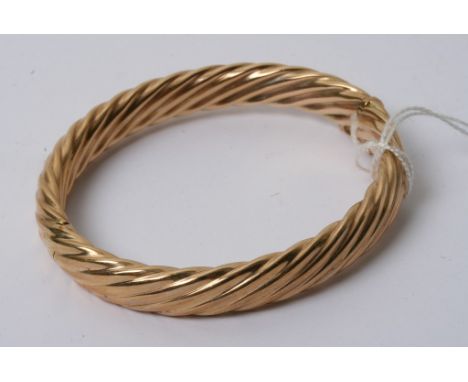 A 9ct gold rope twist bangle 