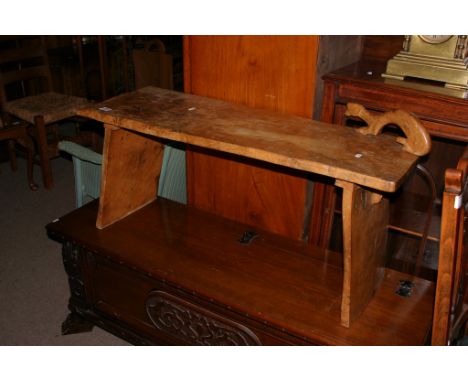 A burr elm table with carved figural decoration of a stoat in the manner of Robert 'Mouseman' Thompson.