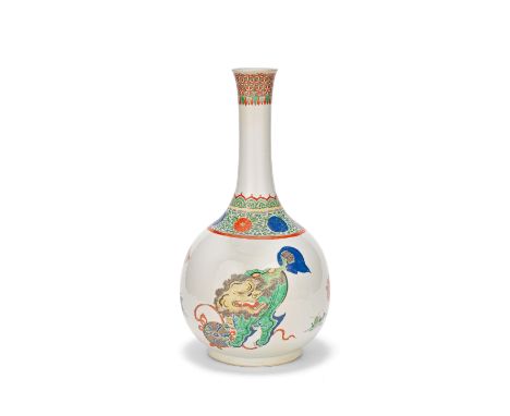 A FAMILLE VERTE 'BUDDHIST LIONS' BOTTLE VASEKangxiThe large pear-shaped bottle raised on a short foot, the tall waisted cylin