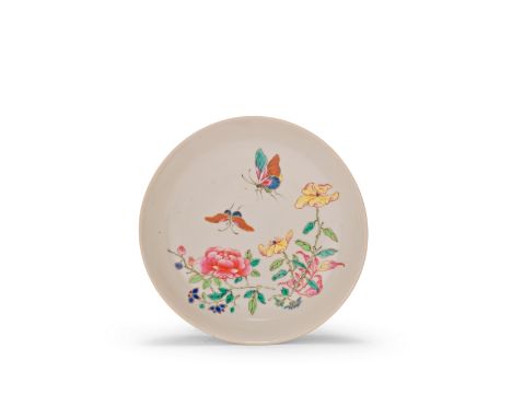 A FAMILLE ROSE RUBY-BACK 'BUTTERFLIES' DISHYongzhengDecorated to the interior with floral sprays and butterflies, the exterio
