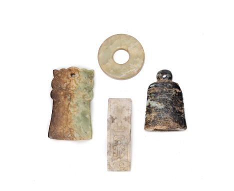 FOUR ARCHAISTIC JADE CARVINGSEarly 20th CenturyComprising: a celadon jade circular bi disc; a sword slide; a 'chicken bone' j