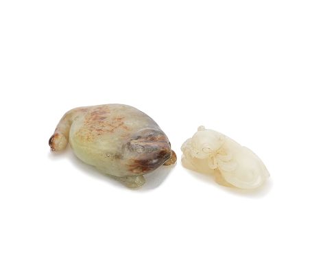A PALE GREEN JADE 'TOAD' CARVING AND A WHITE JADE 'CAT' CARVING17th and 19th centuryComprising: a pale green and russet three