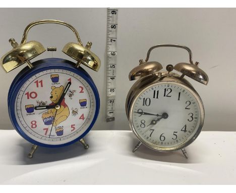 One vintage and one other alarm clock including Winnie the Pooh 