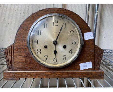 A Art Deco period wooden cased Enfield mantle clock with pendulum (untested). Shipping unavailable 