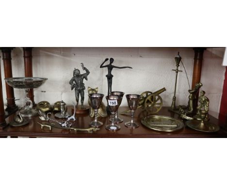 Shelf of metalware