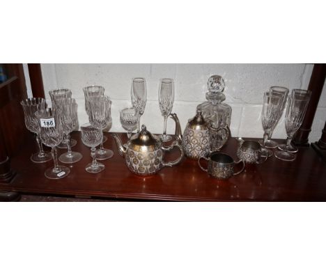 Shelf of cut glass and silver plated tea set