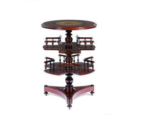 A Regency side table / rotating bookcaseSolid rosewood of rosewood and jacaranda veneersCentral shaft of two galleried rotati