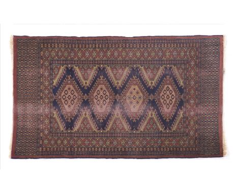 A Lahore rug, PakistanWool and cotton of geometric pattern in bordeaux and blue shades(wear)146x93 cm