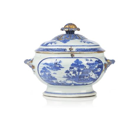 A tureen and coverChinese export porcelainOriental landscape blue and gilt decoration on white ground with armorial for the P