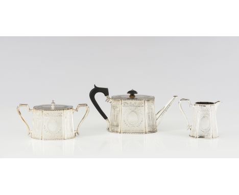 A tea setComprising of teapot, milk jug and sugar bowlSilver 925/000Neoclassical decoration, wooden  teapot finial and handle