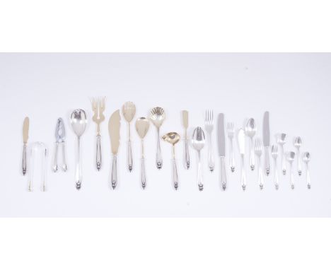 A twelve cover cutlery setComprising: 11 serving utensils; soup spoons; dinner knives and forks; fish knives and forks; desse