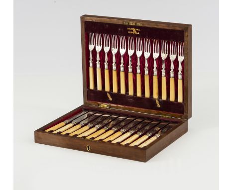 A set of twelve WALKER & HALLS forks and knivesSilver plate Ivory grips In storage case (wear)Comp.: 21 cm (knife)*This item 