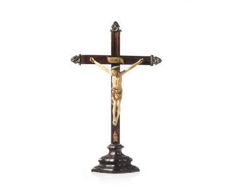 A Crucified ChristIndo-Portuguese ivory sculpture evidencing remains of polychrome decoration and gildingBrazilian mahogany c