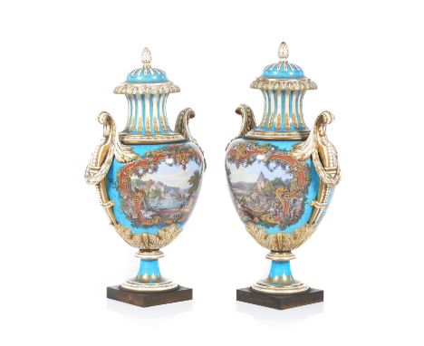 An imposing pair of amphorae and coversSÃ¨vres porcelain_x000D_Rare decoration of cartouches with figures and English hunting