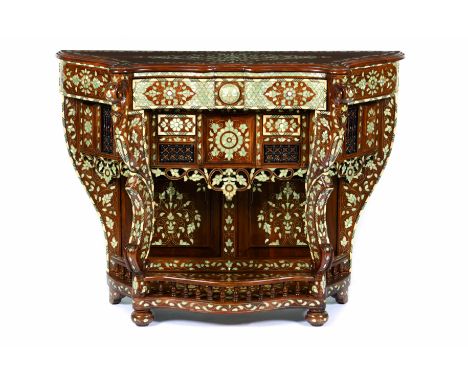 A consoleWood of mother-of-pearl and ivory floral and foliage marquetry decoration and inlaid metal filleting Three drawers G