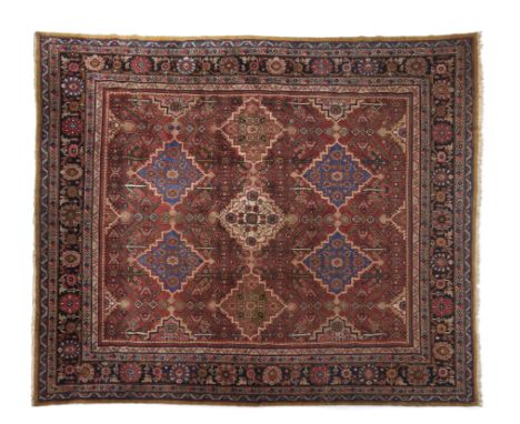 A Mahal rug, IranWool and cotton of geometric pattern in bordeaux, blue and beige shades(wear)372x320 cm