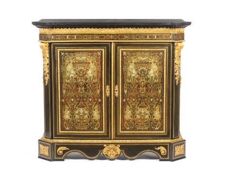 A Napoleon III Boulle style cabinetEbonised wood Two doors and inner shelf Gilt metal and turtle shell inlaid decoration of c