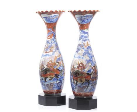 A pair of large size vasesJapanese porcelainPolychrome and gilt decoration of floral motifs, landscapes and battle scenes wit