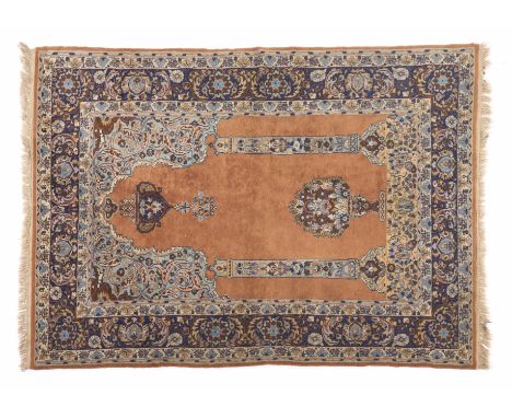 A Lahore rug, PakistanWool and silk of geometric and floral pattern in beige and blue shades184x129 cm