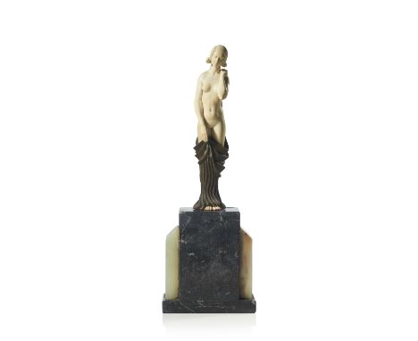 Art Deco bronze sculptureIvory feet and bodyVarious marbles standFrance, 20th centuryHeight: 27,5 cm (sculpture) Height: 44,5