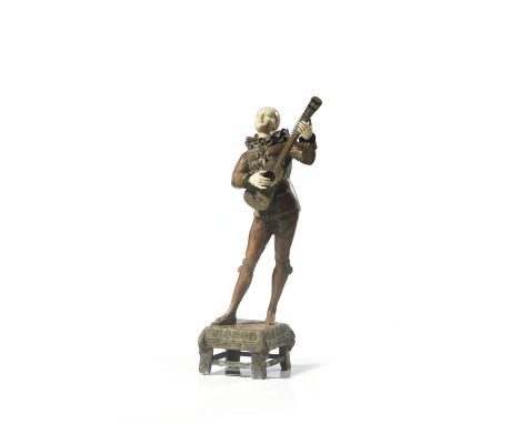 A Chryselephantine Pierrot playing the guitar figureBronze sculptureIvory hands and headSigned "L. Raphael"France, 20th centu