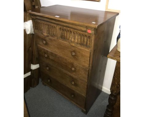 * NIGEL GRIFFITHS: A HANDMADE OAK CHEST OF DRAWERS of Jacobean style, the rectangular top above two short &nbsp;hand carved d