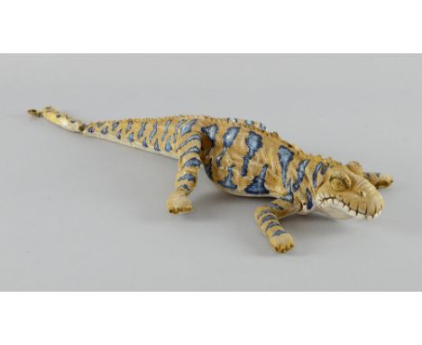 ¹ The Flintstones (1994) a prop prehistoric Lizard creature made of painted foam, clearly seen in the movie being placed in a