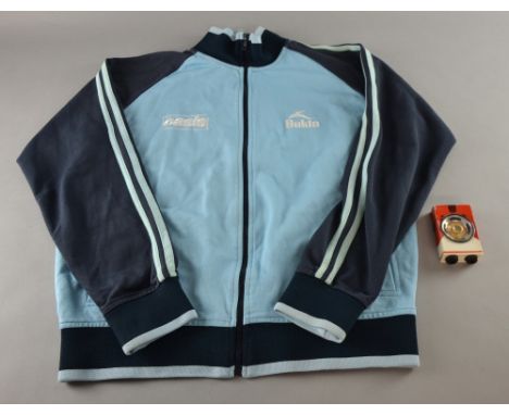 Oasis, English Rock Band, a promotional jacket (Size L) & a mini amp disguised as a pack of playing cards (2)