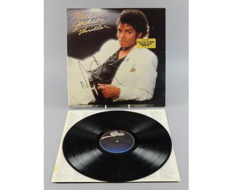 Michael Jackson Thriller gatefold Vinyl LP album signed to the front cover in clear black felt tip