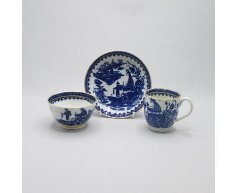 A Caughley  porcelain blue white and gilt trio, coffee cup, tea bowl and saucer, decorated with The Fisherman and Cormorant p