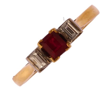 An 18ct gold three stone ruby and diamond ring, set with square step-cut ruby of approx 0.4ct flanked by baguette-cut diamond