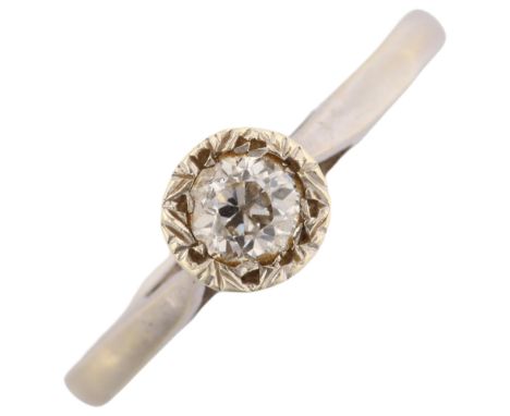 A mid-20th century 0.25ct solitaire diamond ring, unmarked white metal settings with illusion design, size Q, 2.9gNo damage o