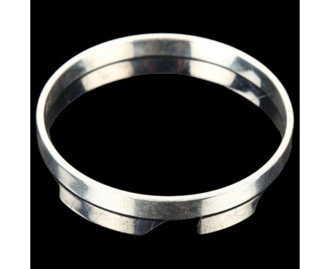 RUDOLF ANDRESEN - a Danish silver plain form slave bangle, band width 6.6mm, internal circumference 19cm, 26gNo damage or rep