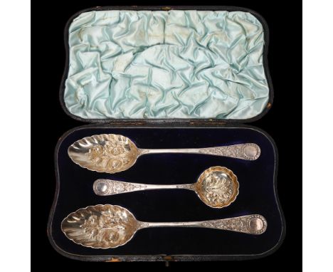 A Victorian cased set of silver berry spoons, William Hutton & Sons Ltd, London 1894, leaf embossed and gilded bowls, largest